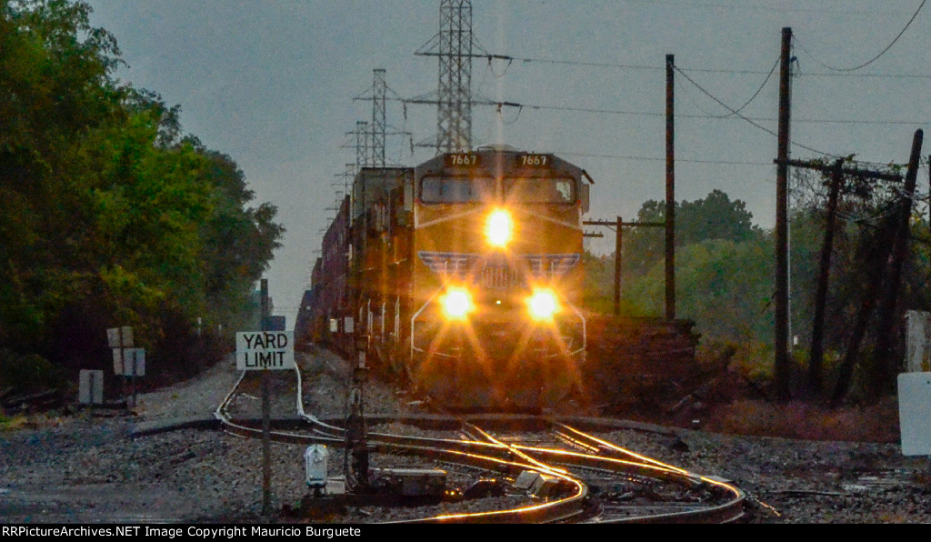 UP AC45CCTE locomotive leading a train in the Yard